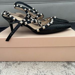 Brand new BCBG studded black heel